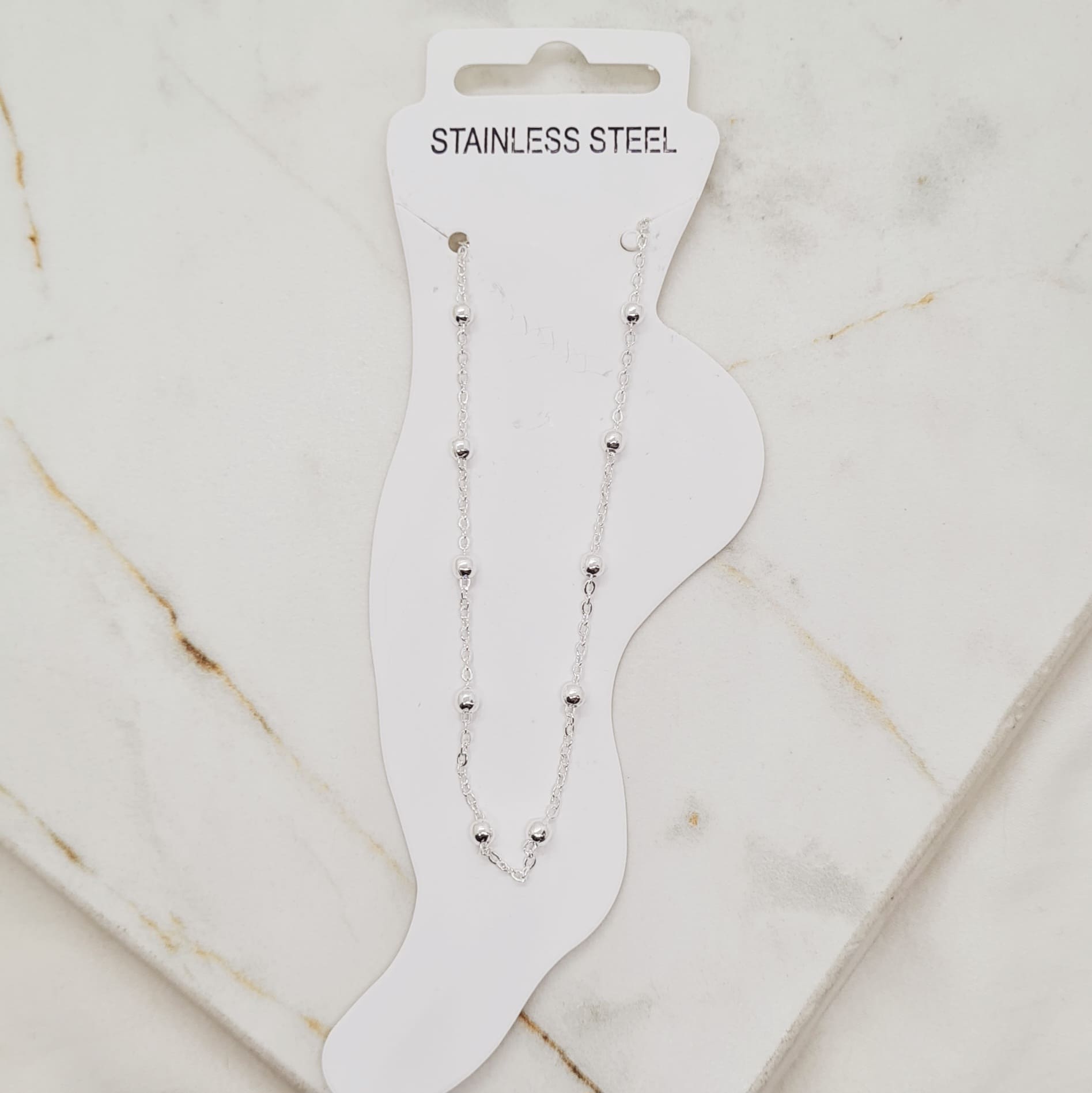 Imagen de producto TOBILLERA ACERO BLANCO CON BOLITAS
