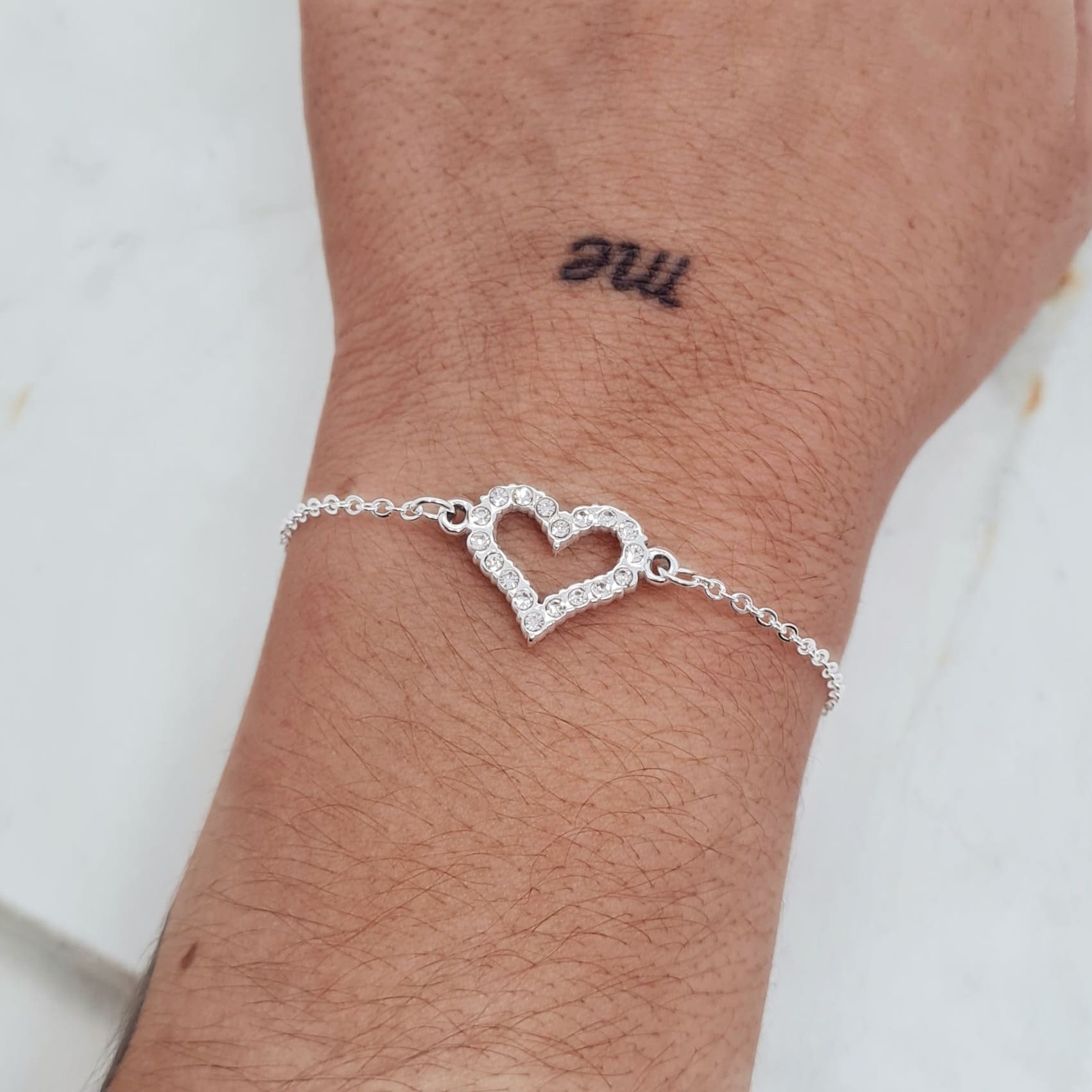 Imagen de producto PULSERA ACERO BLANCO CORAZON CALADO CON STRASS