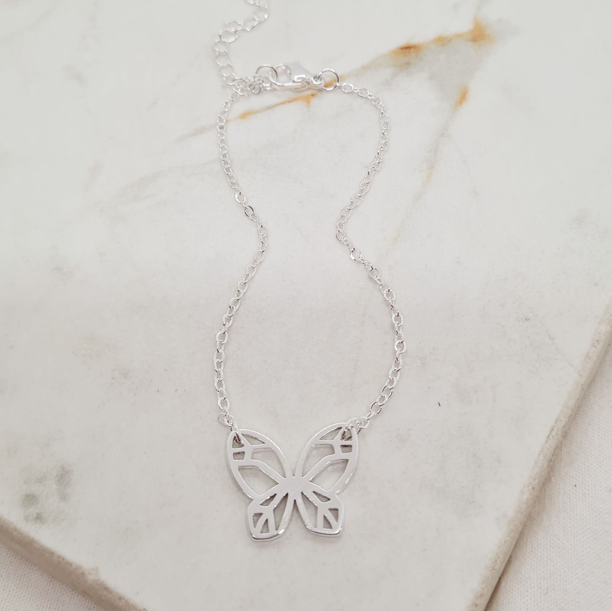Imagen de producto PULSERA ACERO BLANCO CON DIJE ENGARZADO - MARIPOSA