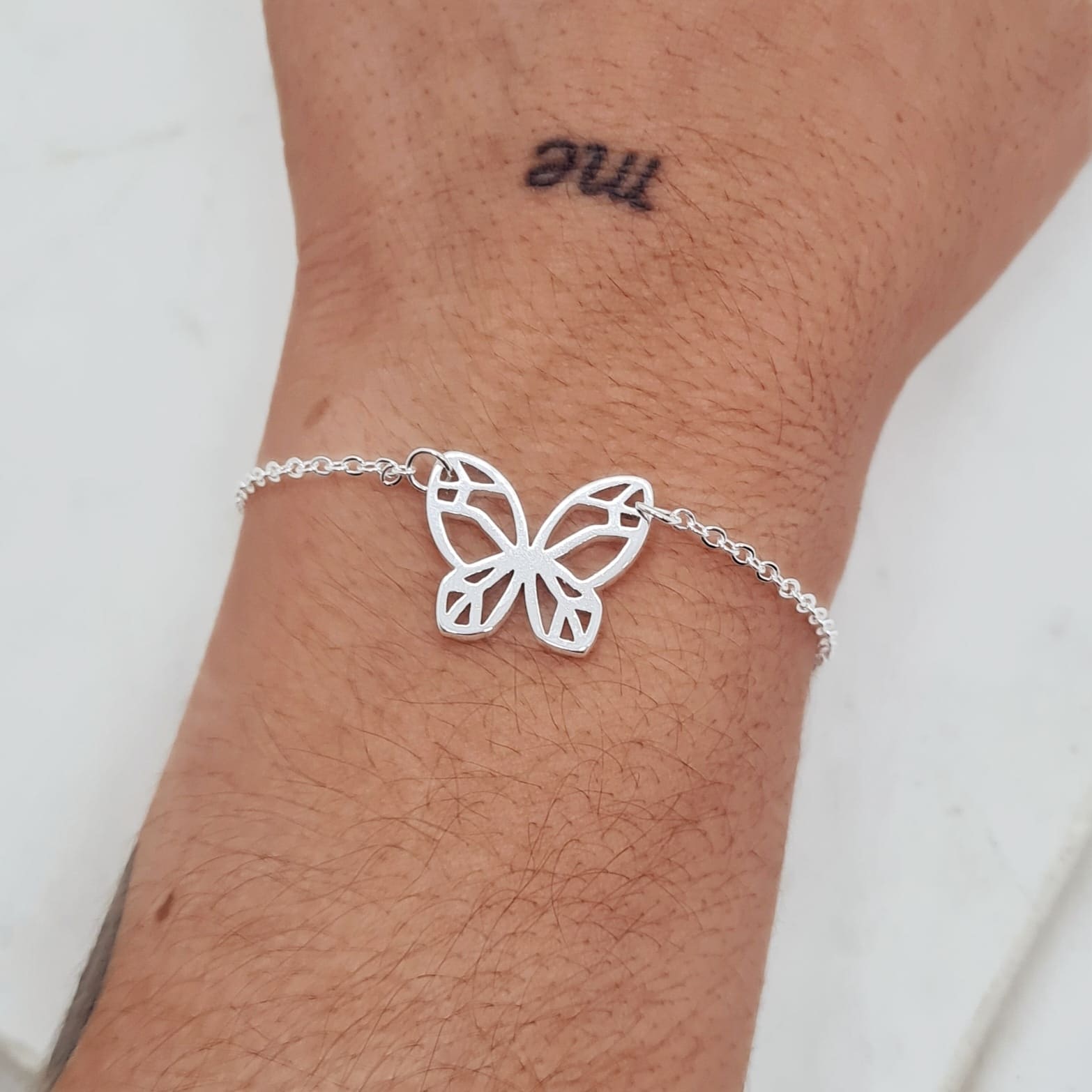 Imagen de producto PULSERA ACERO BLANCO CON DIJE ENGARZADO - MARIPOSA