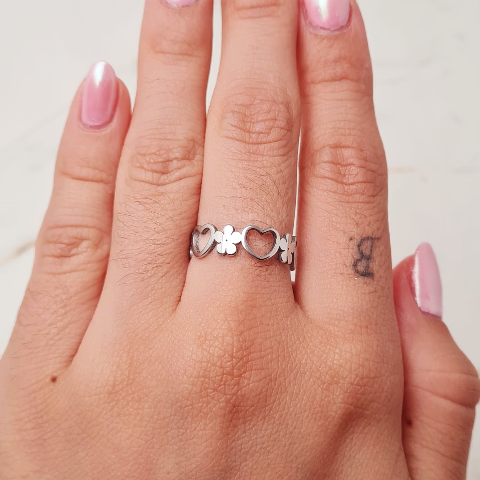 Imagen de producto ANILLO CALADO CORAZON Y FLOR CONTINUO