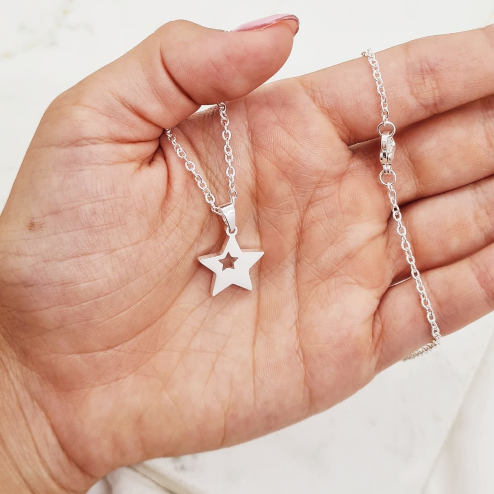 Imagen de producto COLLAR ACERO BLANCO CON DIJE MACIZO - ESTRELLA CON ESTRELLITA CALADA