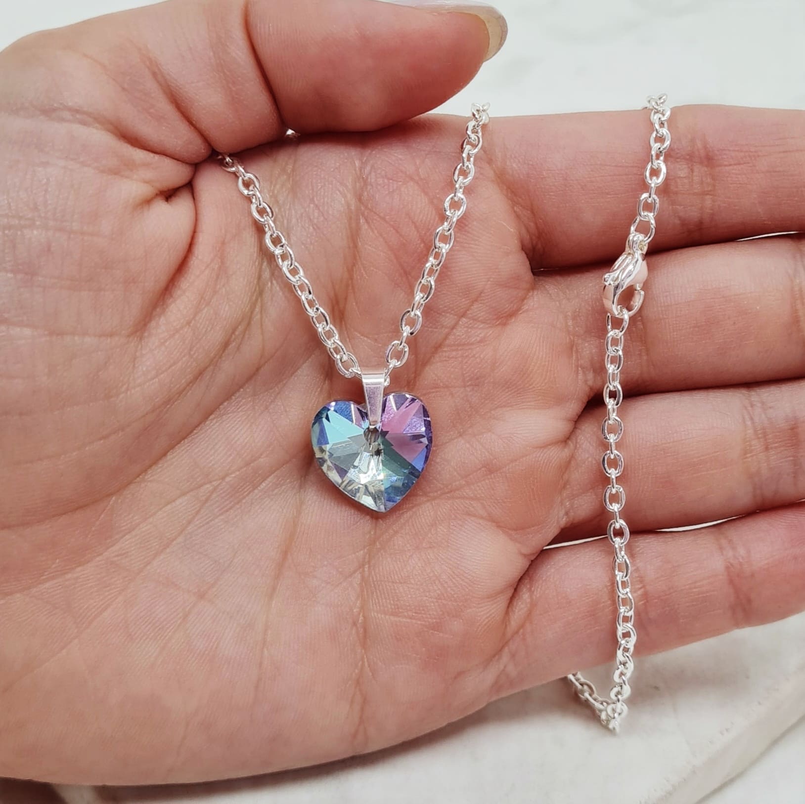 Imagen de producto COLLAR ACERO BLANCO CON DIJE CRISTAL - CORAZON TORNASOL CELESTE