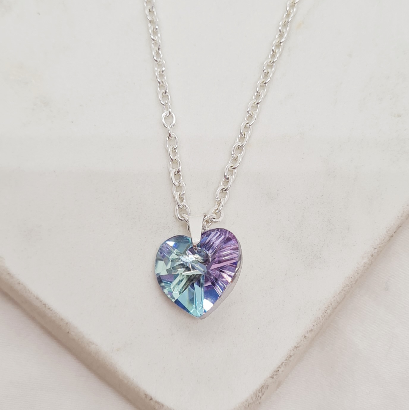 Imagen de producto COLLAR ACERO BLANCO CON DIJE CRISTAL - CORAZON TORNASOL CELESTE