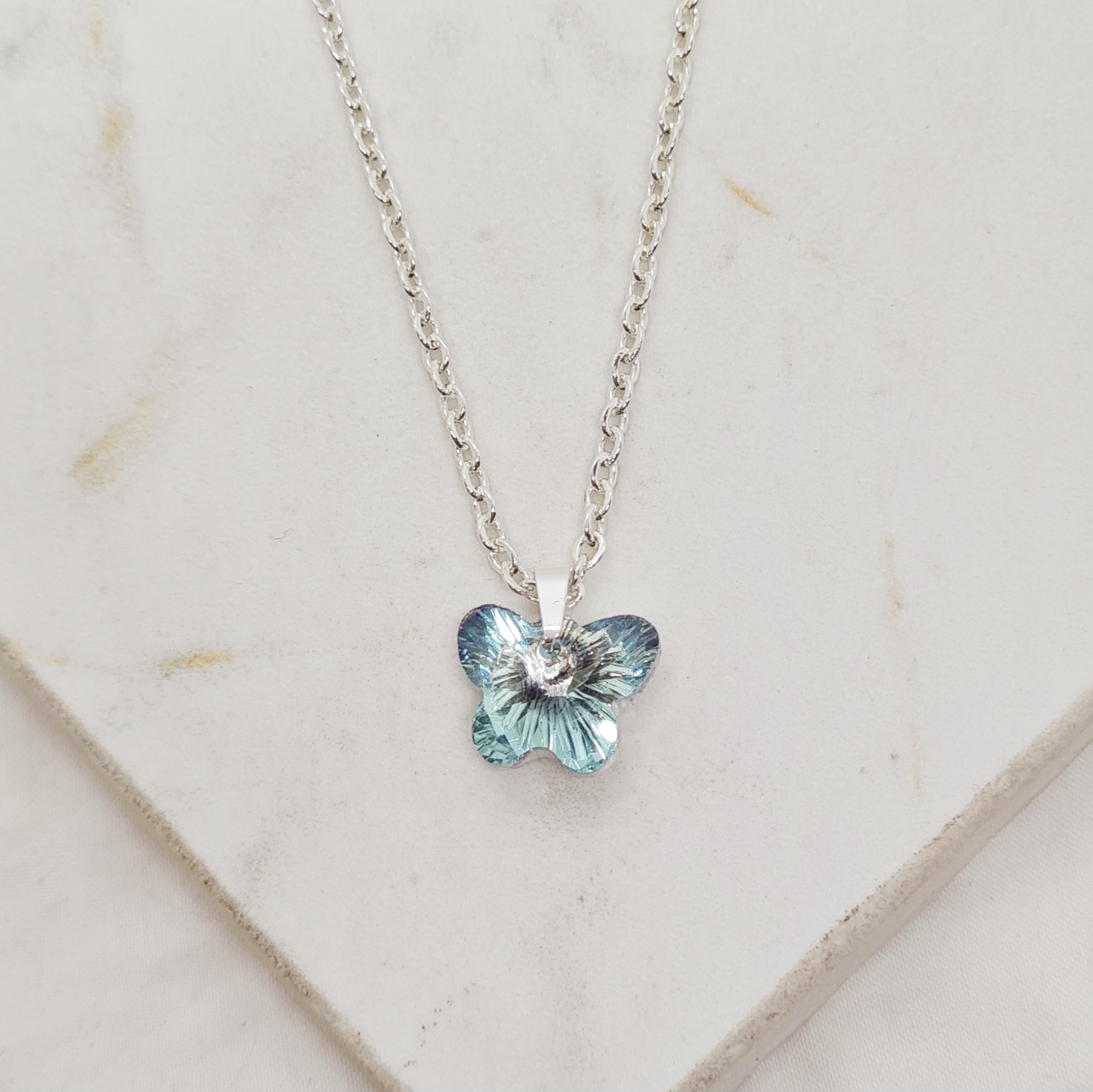 Imagen de producto COLLAR ACERO BLANCO CON DIJE CRISTAL - MARIPOSA CELESTE