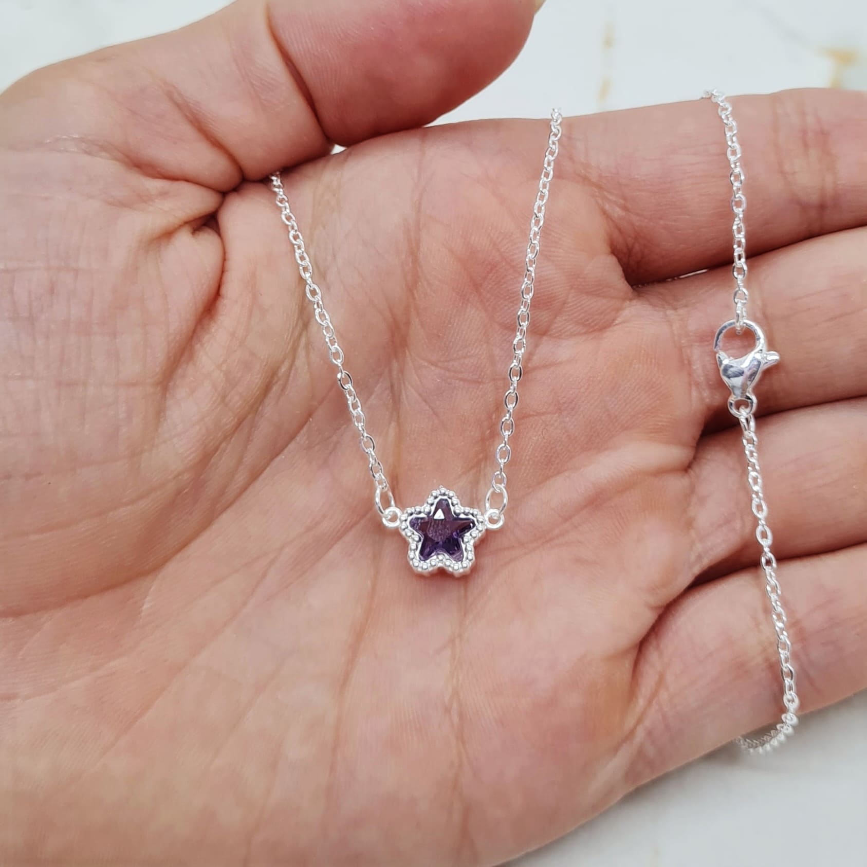 Imagen de producto COLLAR ACERO BLANCO ENGARZADO - ESTRELLA VIOLETA