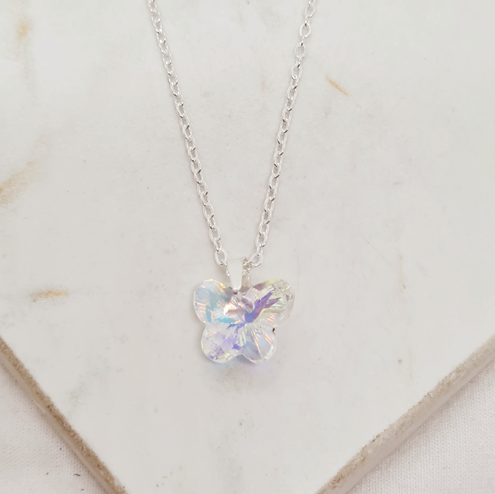 Imagen de producto COLLAR ACERO BLANCO CRISTAL CHICO - MARIPOSA TORNASOL CLARO