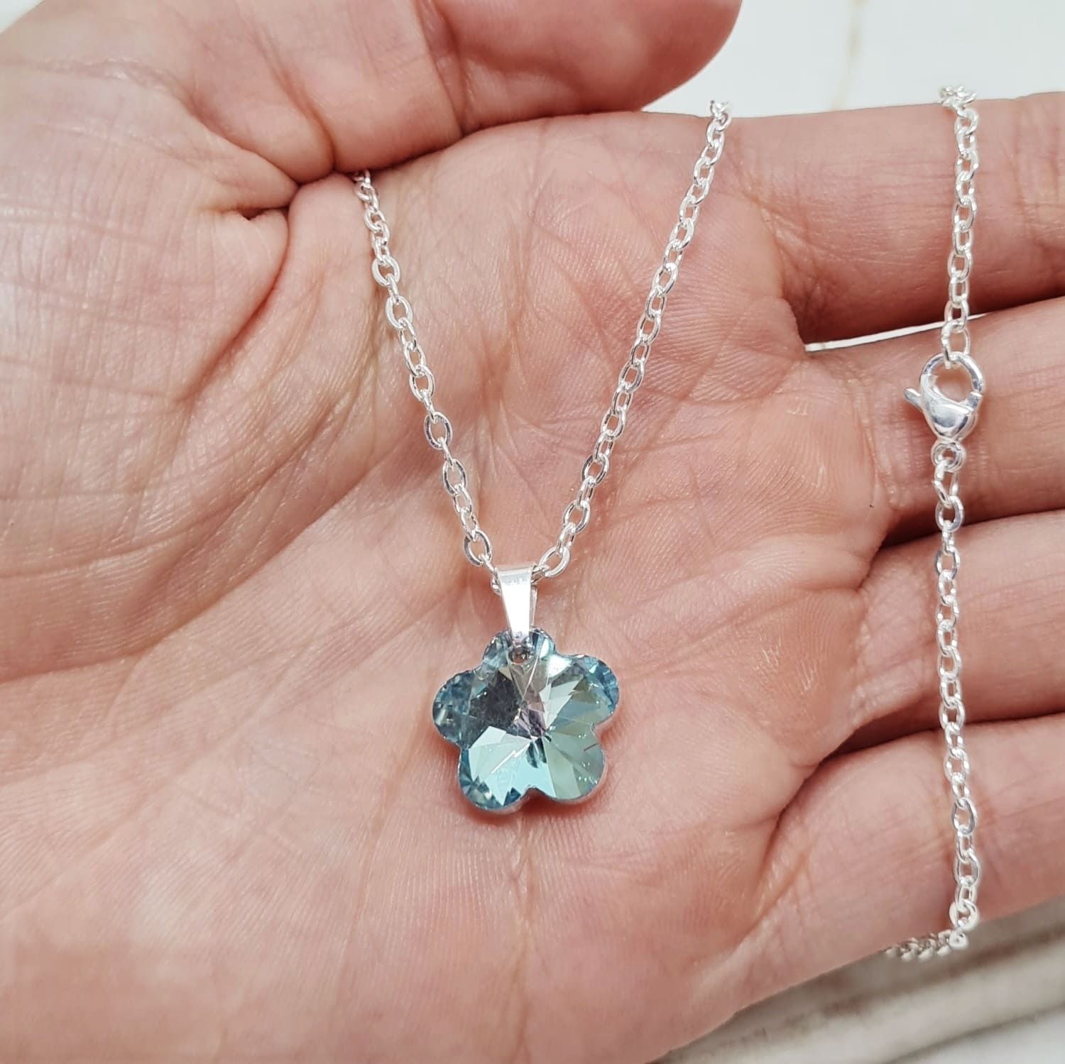 Imagen de producto COLLAR ACERO BLANCO CRISTAL CHICO - FLOR CELESTE
