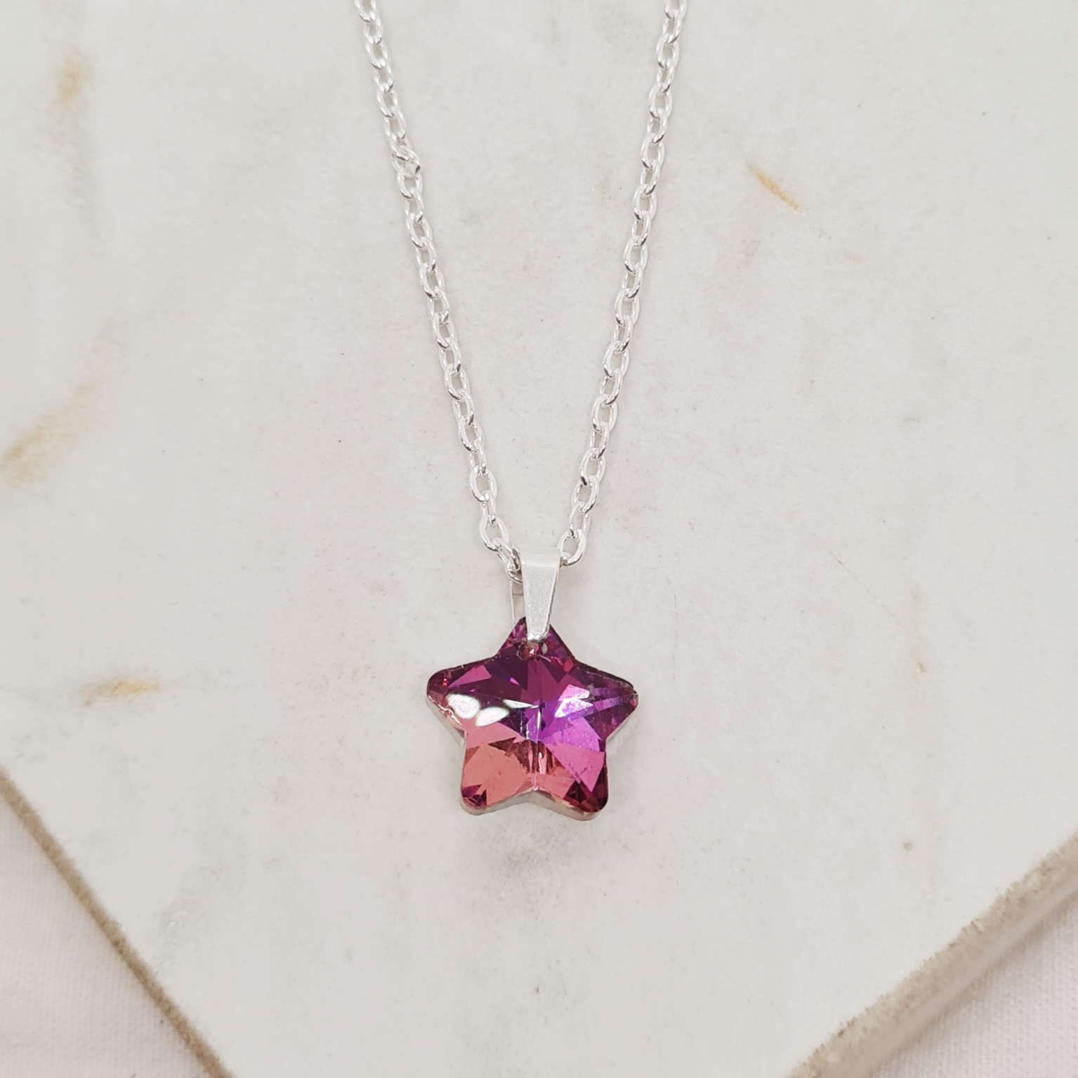 Imagen de producto COLLAR ACERO BLANCO CRISTAL CHICO - ESTRELLA FUCSIA