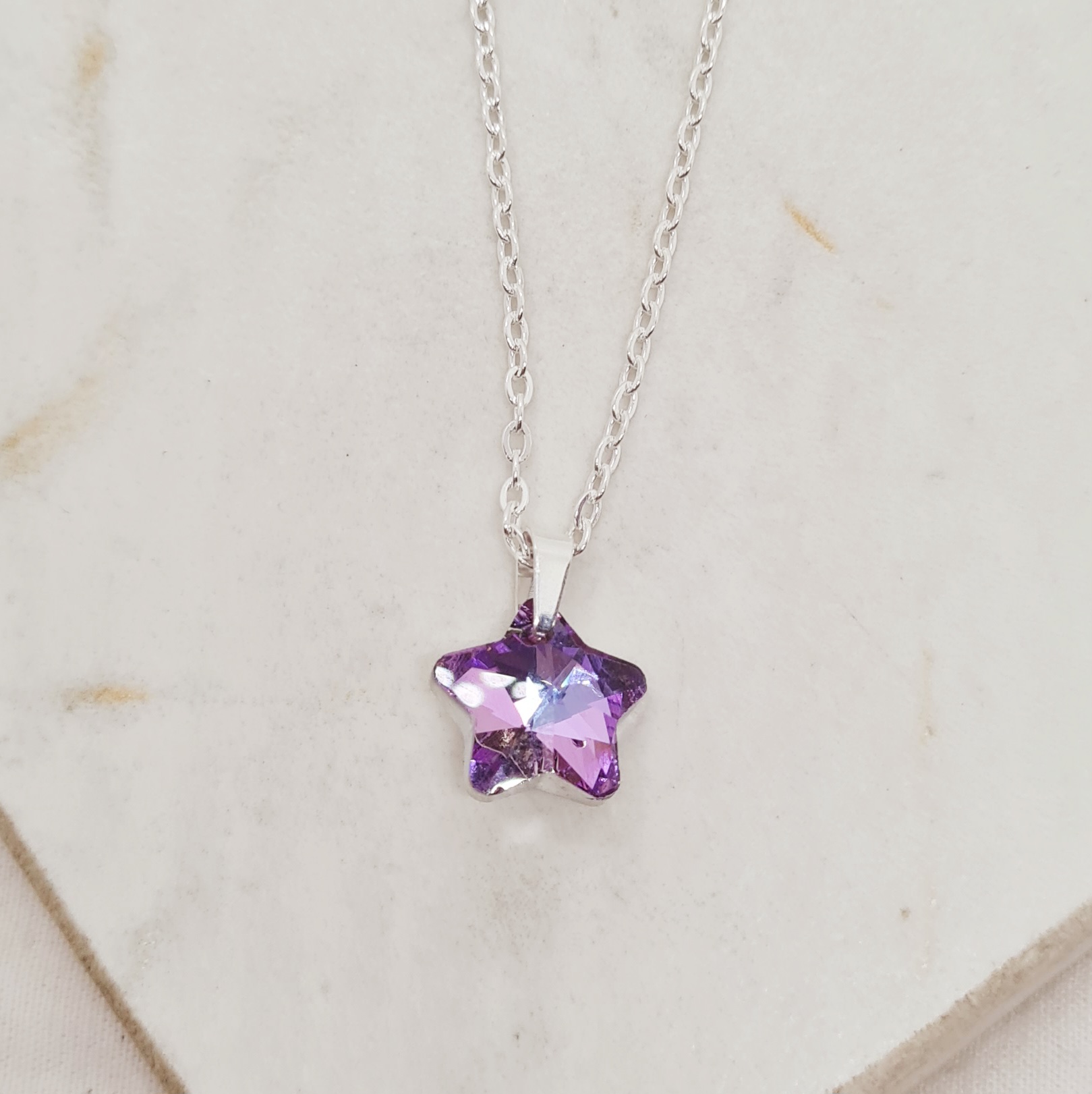 Imagen de producto COLLAR ACERO BLANCO CRISTAL CHICO - ESTRELLA TORNASOL VIOLETA
