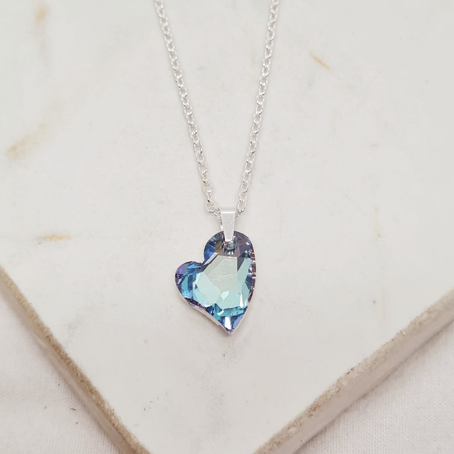 Imagen de producto COLLAR ACERO BLANCO CRISTAL CHICO - CORAZON CURVO CELESTE