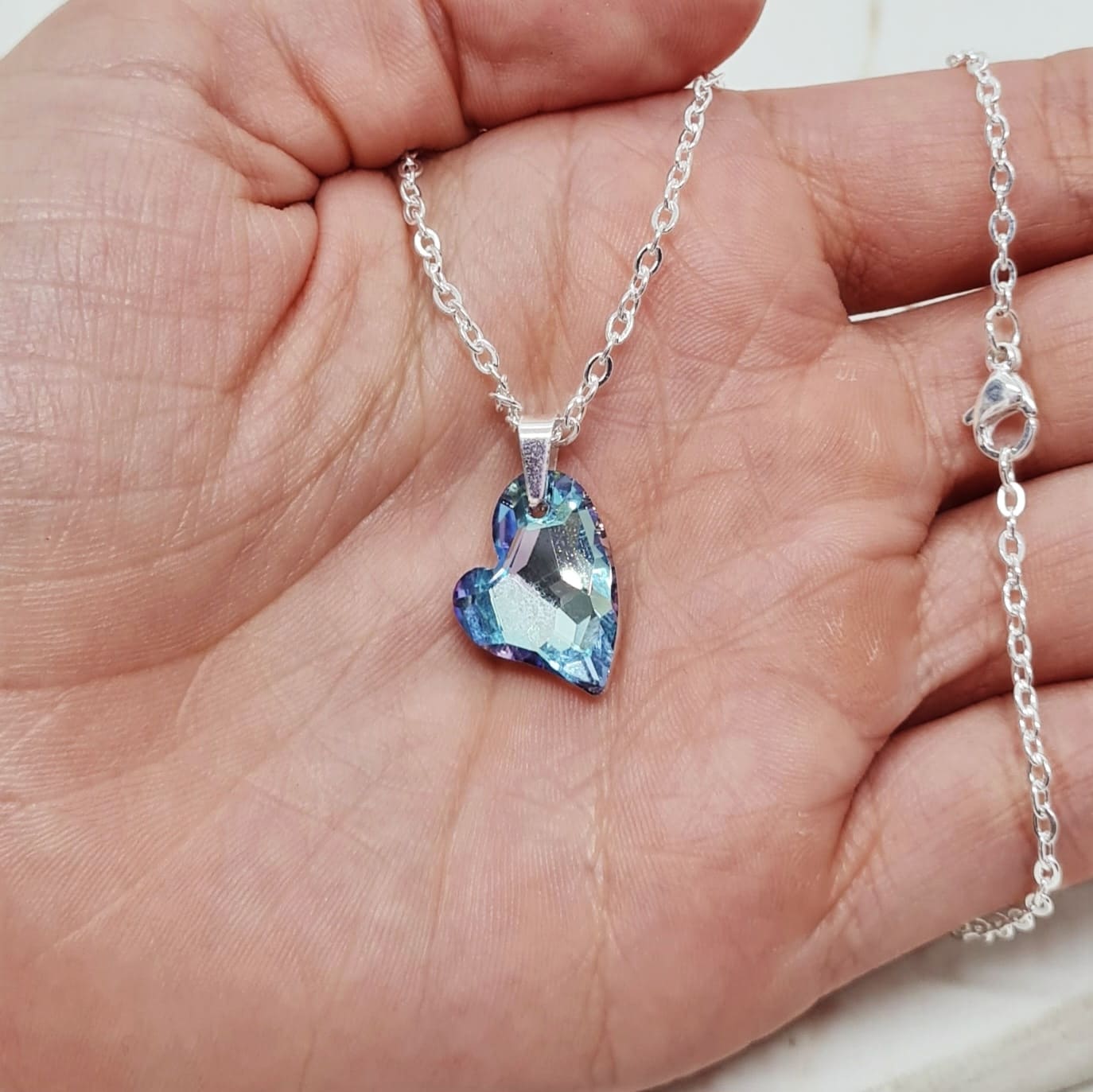 Imagen de producto COLLAR ACERO BLANCO CRISTAL CHICO - CORAZON CURVO CELESTE