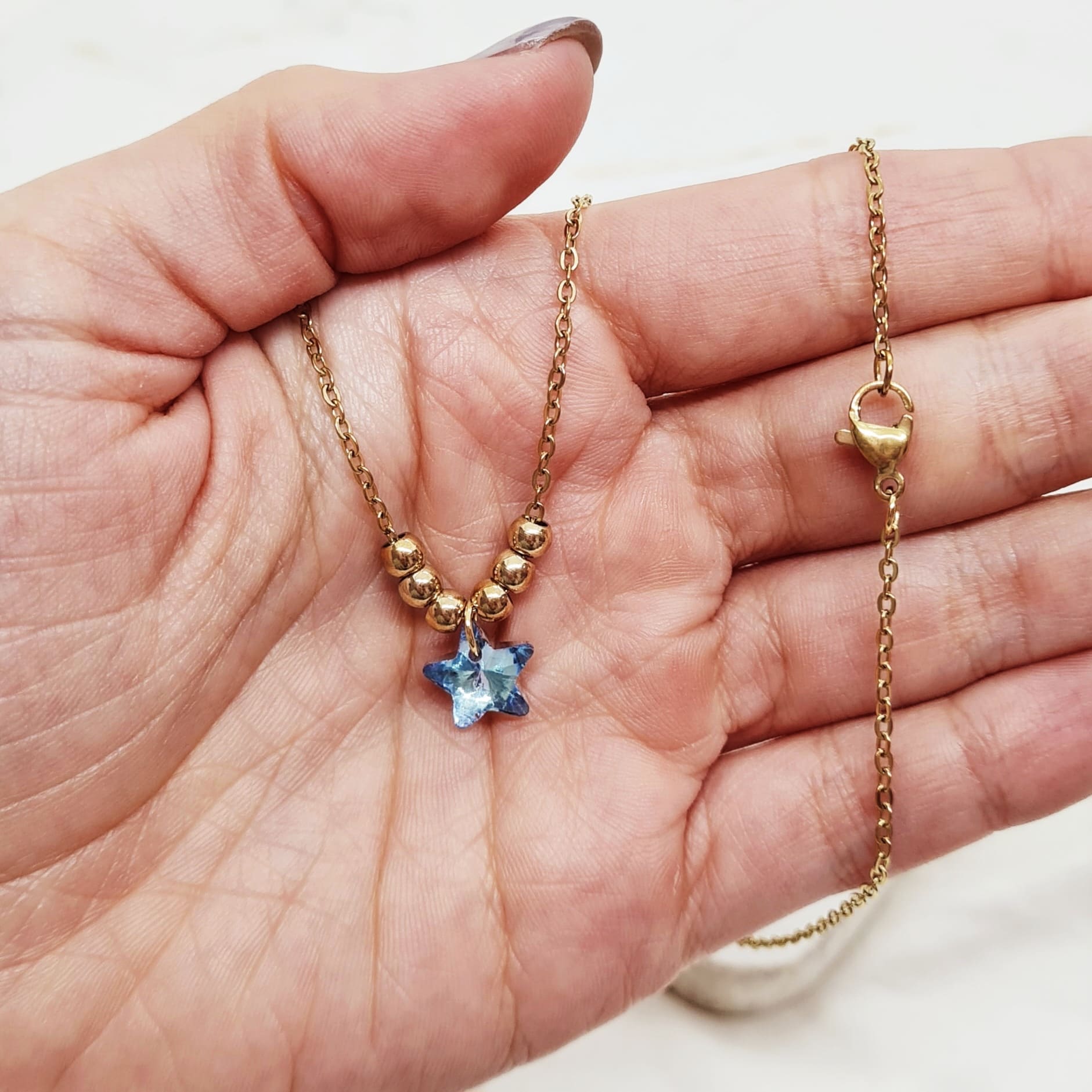 Imagen de producto COLLAR ACERO DORADO CON BOLITAS - ESTRELLA CELESTE