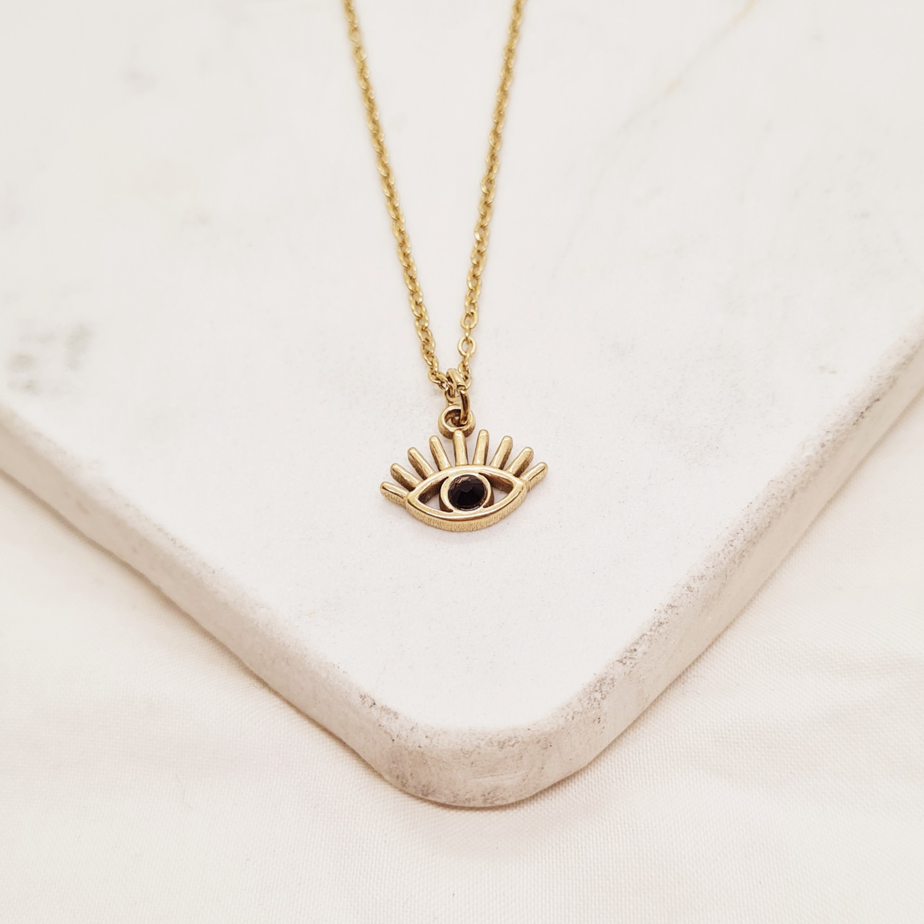 Imagen de producto COLLAR ACERO DORADO - OJO TURCO STRASS NEGRO