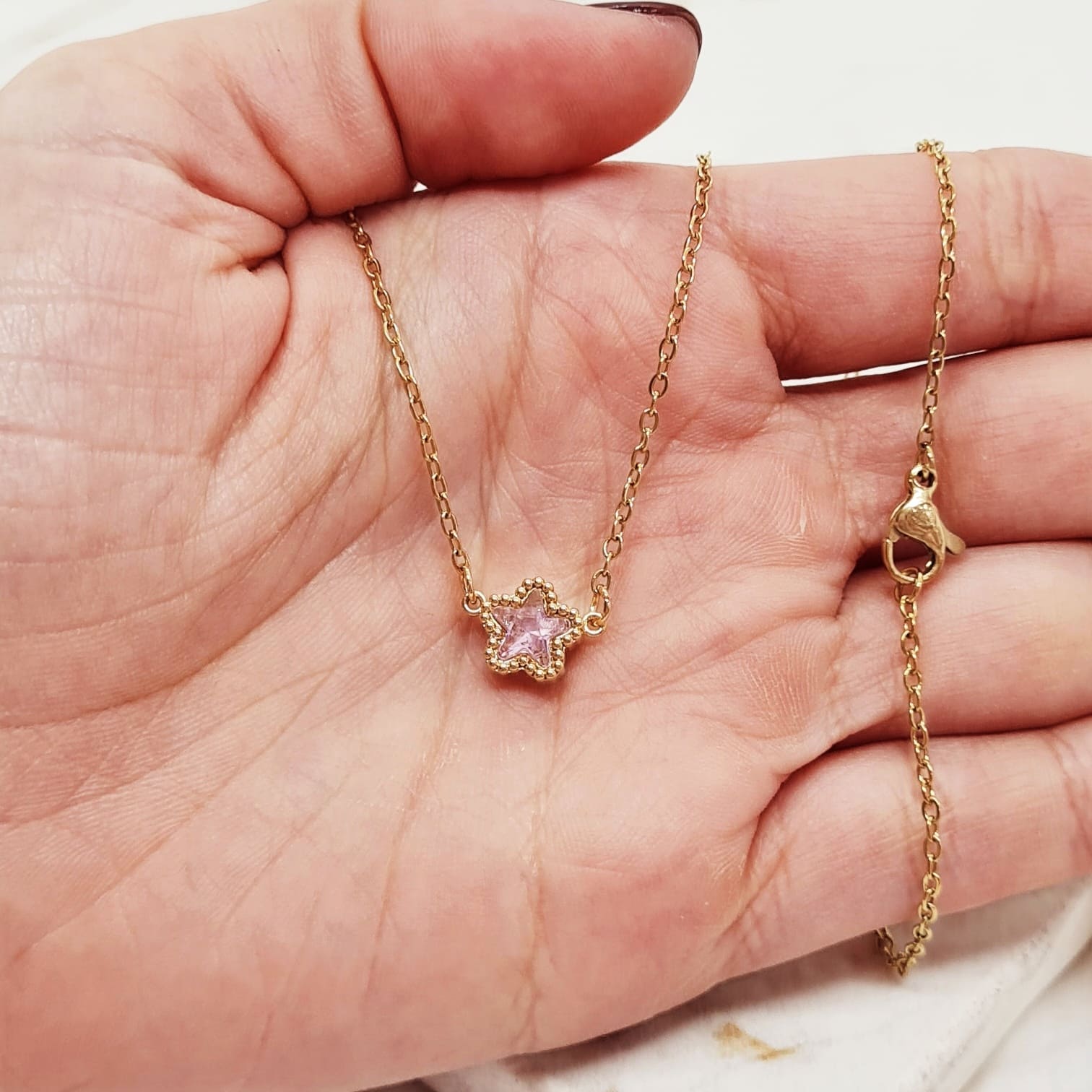 Imagen de producto COLLAR ACERO DORADO ENGARZADO - ESTRELLA ROSA