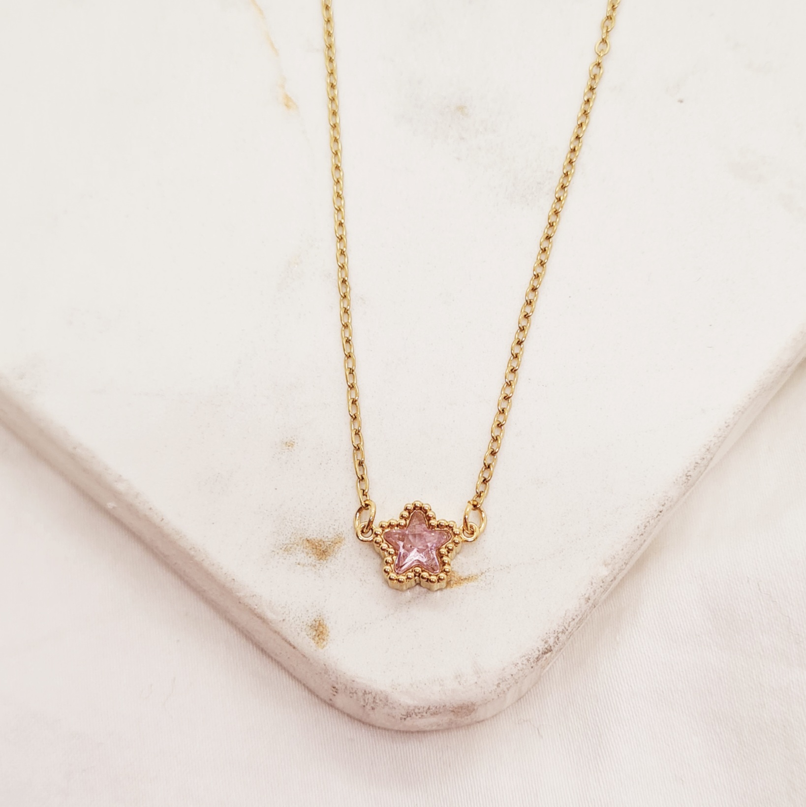 Imagen de producto COLLAR ACERO DORADO ENGARZADO - ESTRELLA ROSA