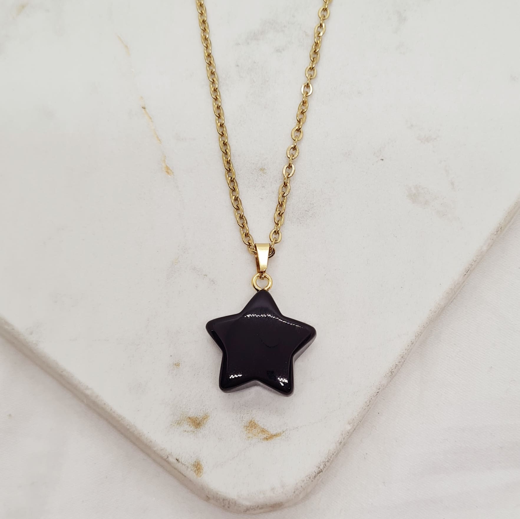 Imagen de producto COLLAR ACERO DORADO CON DIJE CRISTAL - ESTRELLA NEGRA