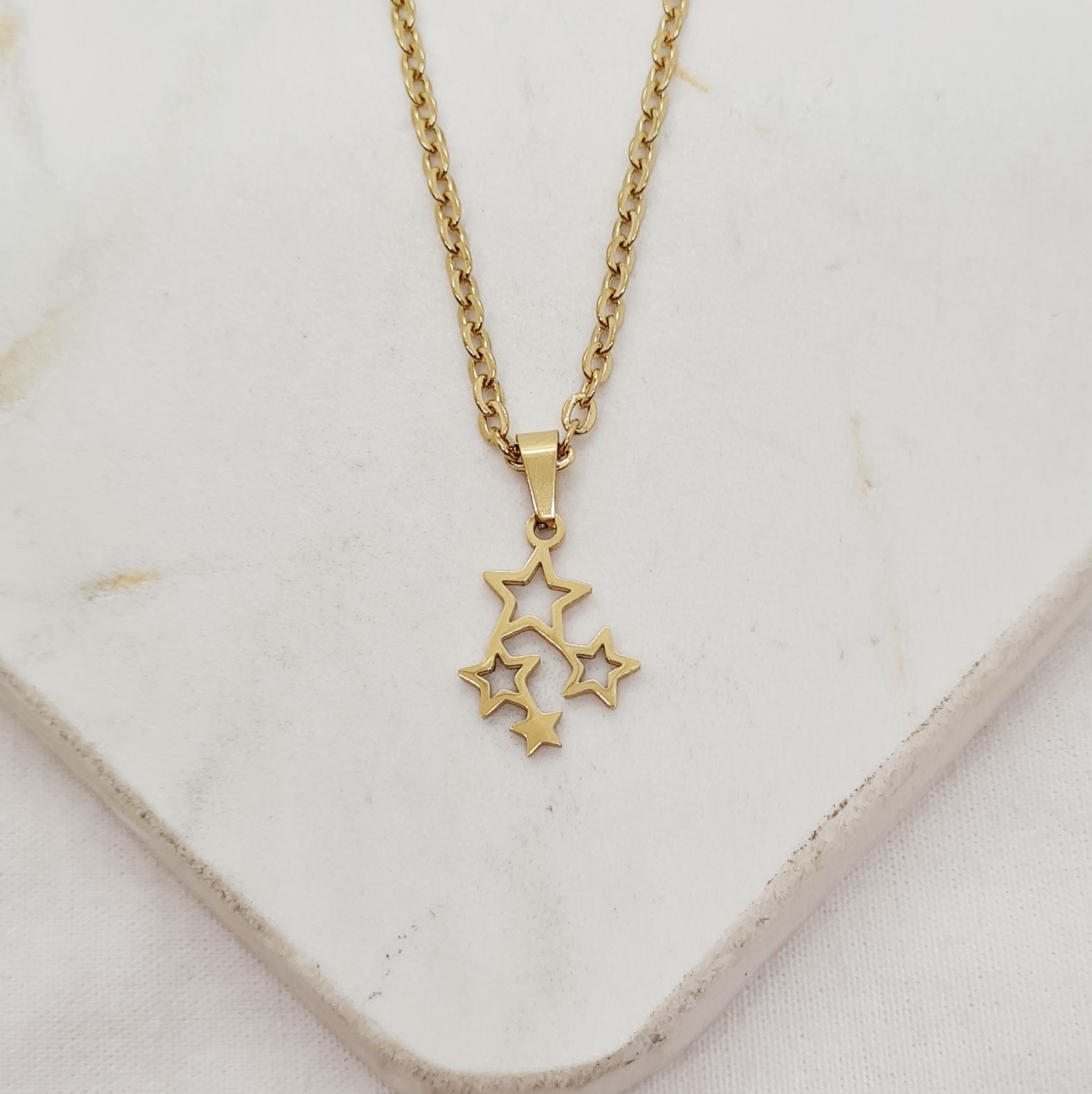 Imagen de producto COLLAR ACERO DORADO - ESTRELLAS CALADAS