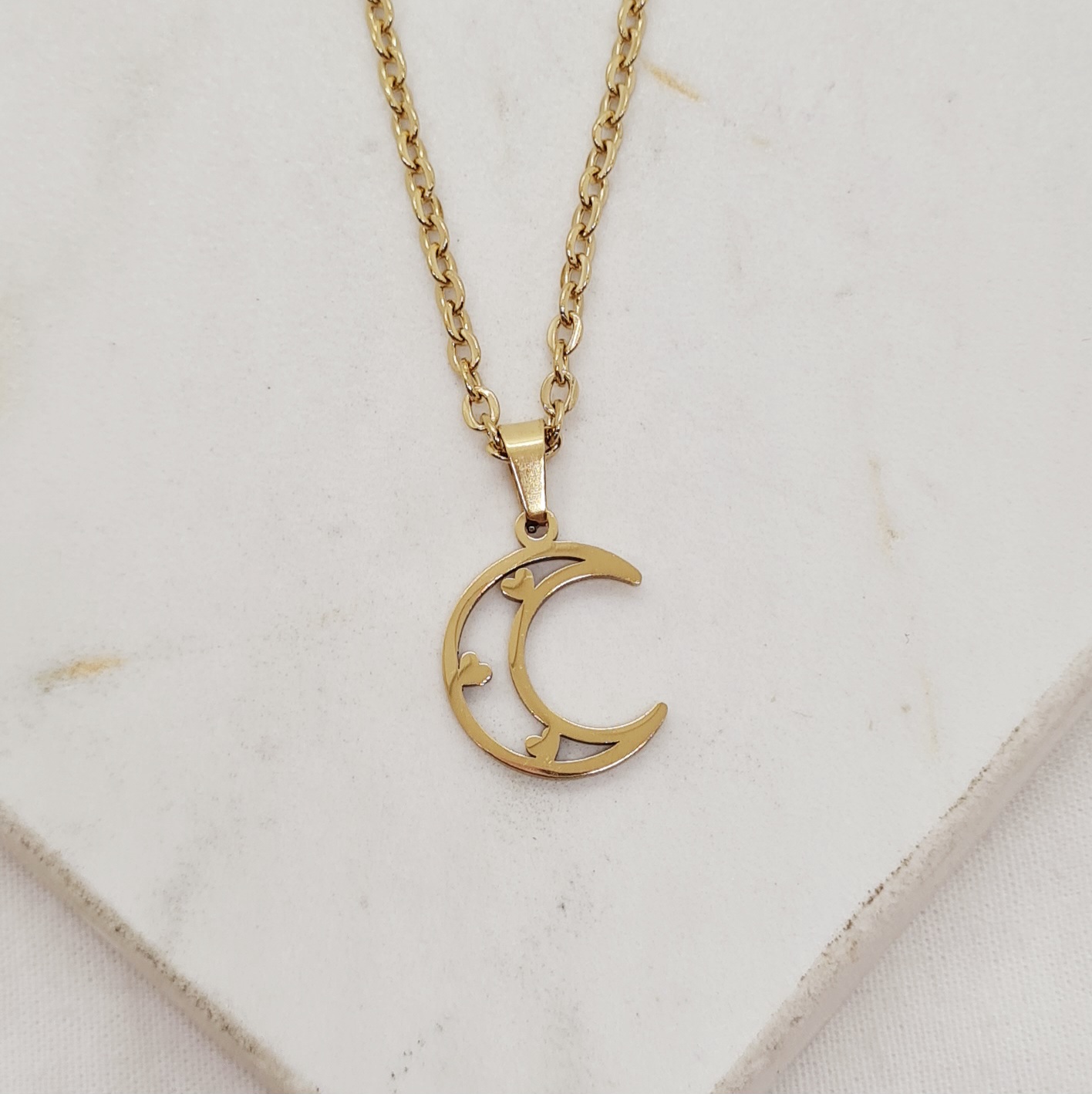 Imagen de producto COLLAR ACERO DORADO - LUNA CALADA CON ESTRELLITAS