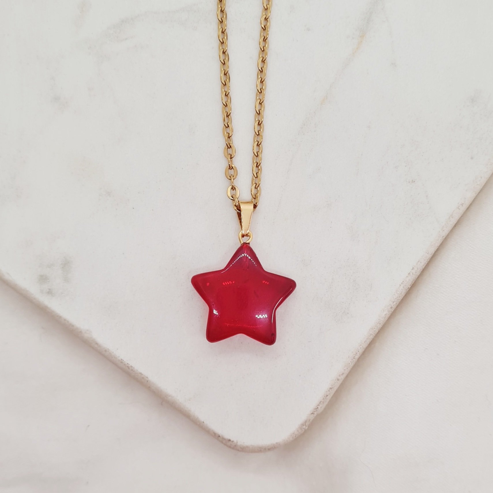 Imagen de producto COLLAR ACERO DORADO CON DIJE CRISTAL - ESTRELLA ROJA
