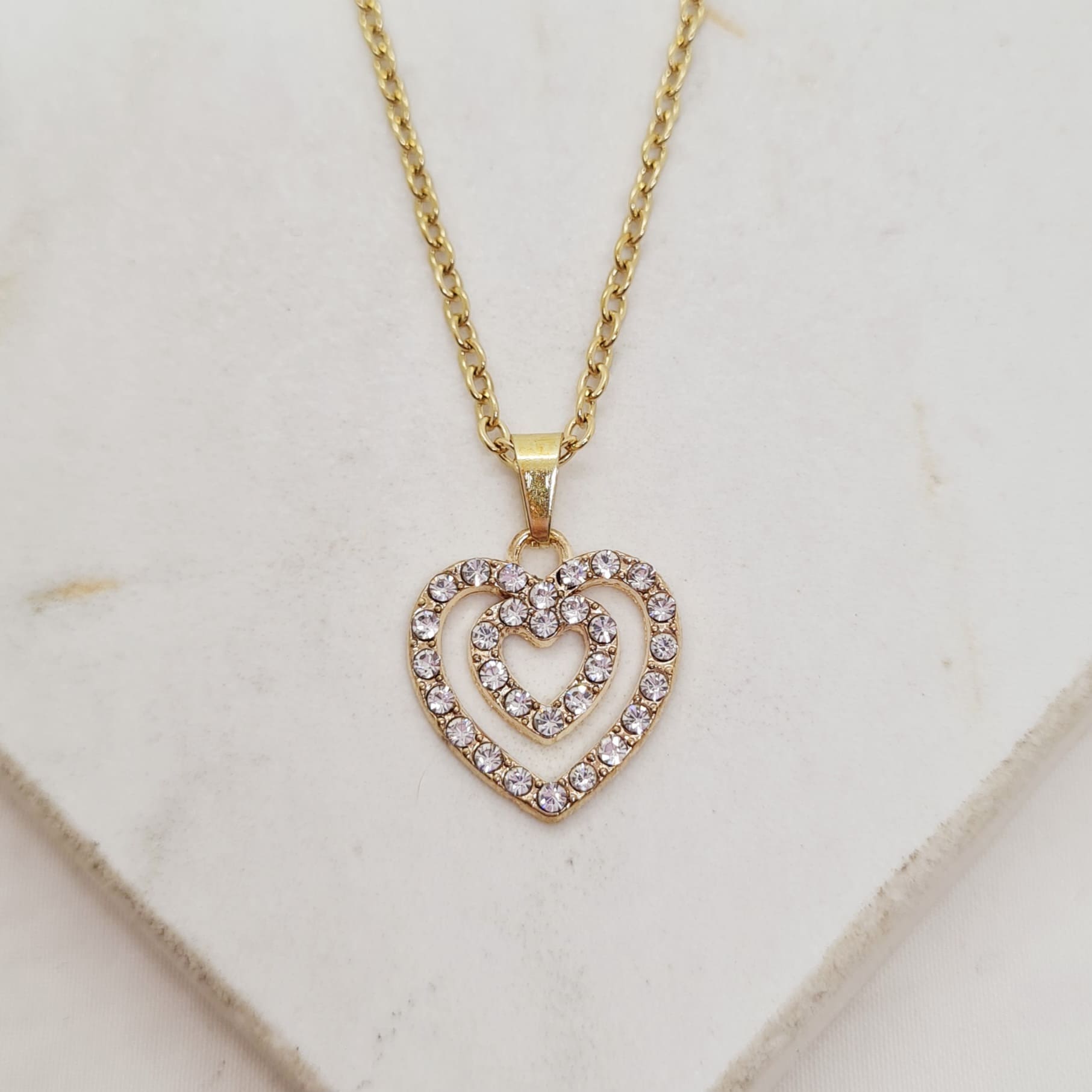 Imagen de producto COLLAR ACERO DORADO - DOBLE CORAZON FULL STRASS