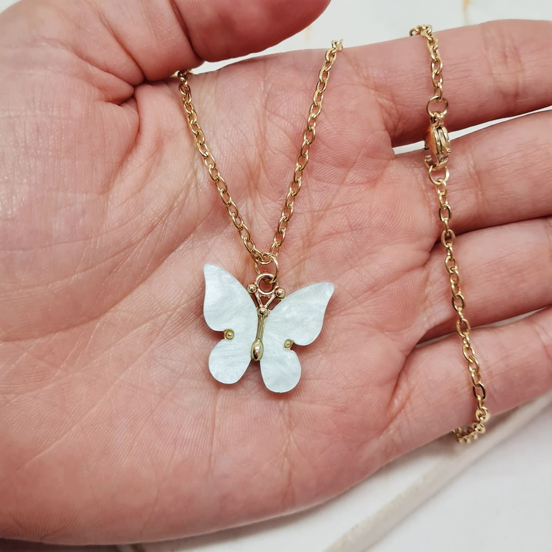Imagen de producto COLLAR ACERO DORADO MARIPOSA GRANDE 2 - TURQUESA