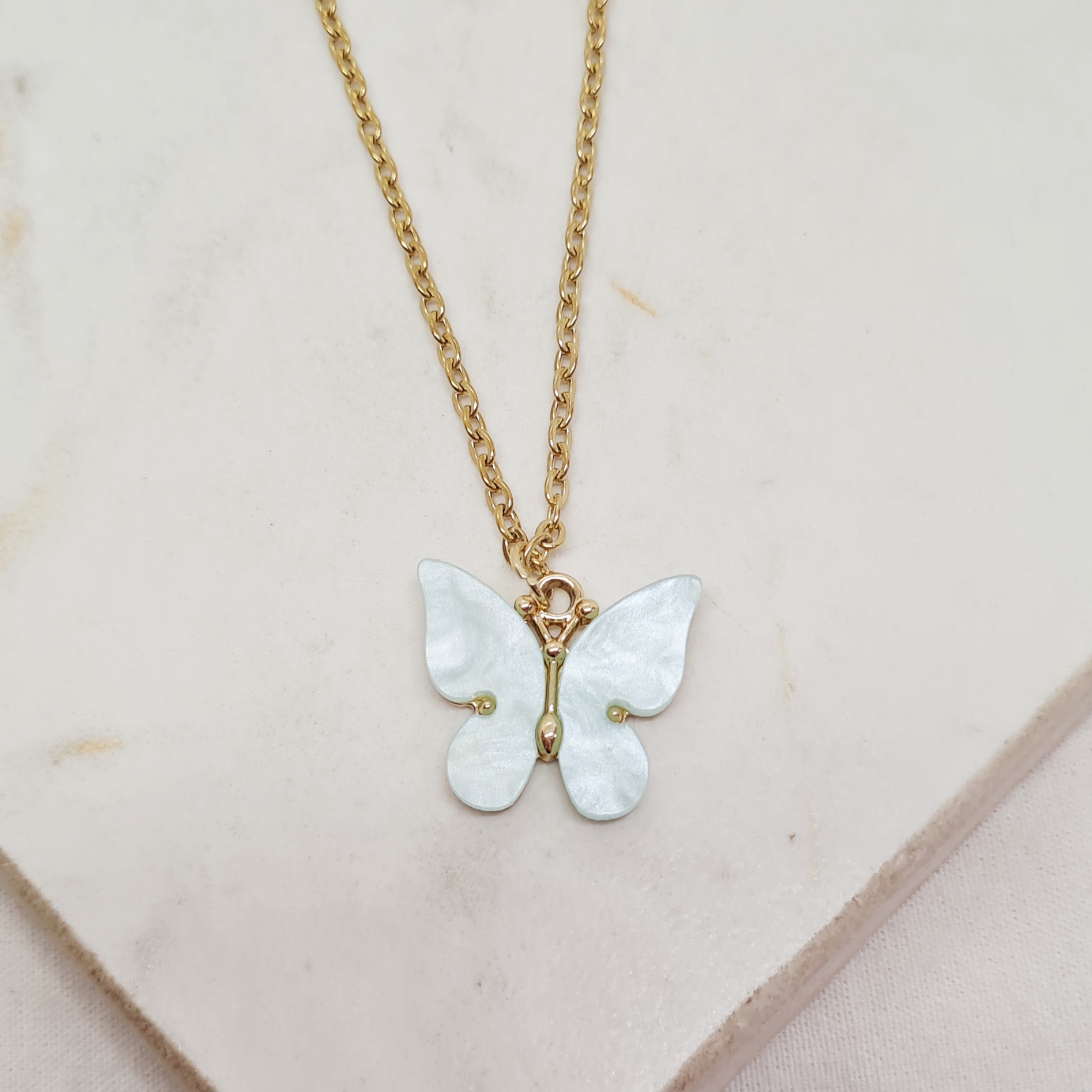 Imagen de producto COLLAR ACERO DORADO MARIPOSA GRANDE 2 - TURQUESA