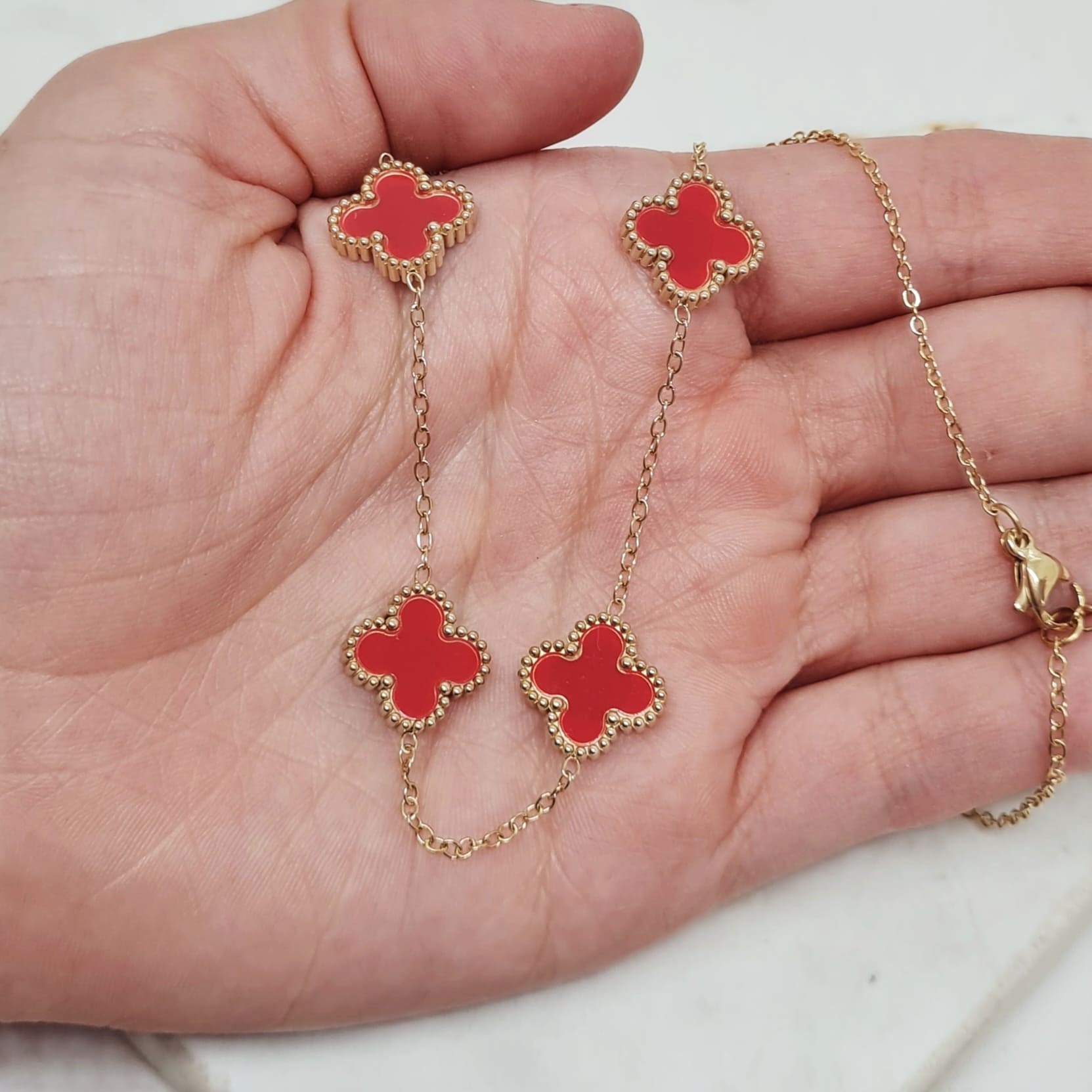 Imagen de producto COLLAR ACERO DORADO VAN CLEEF - ROJO