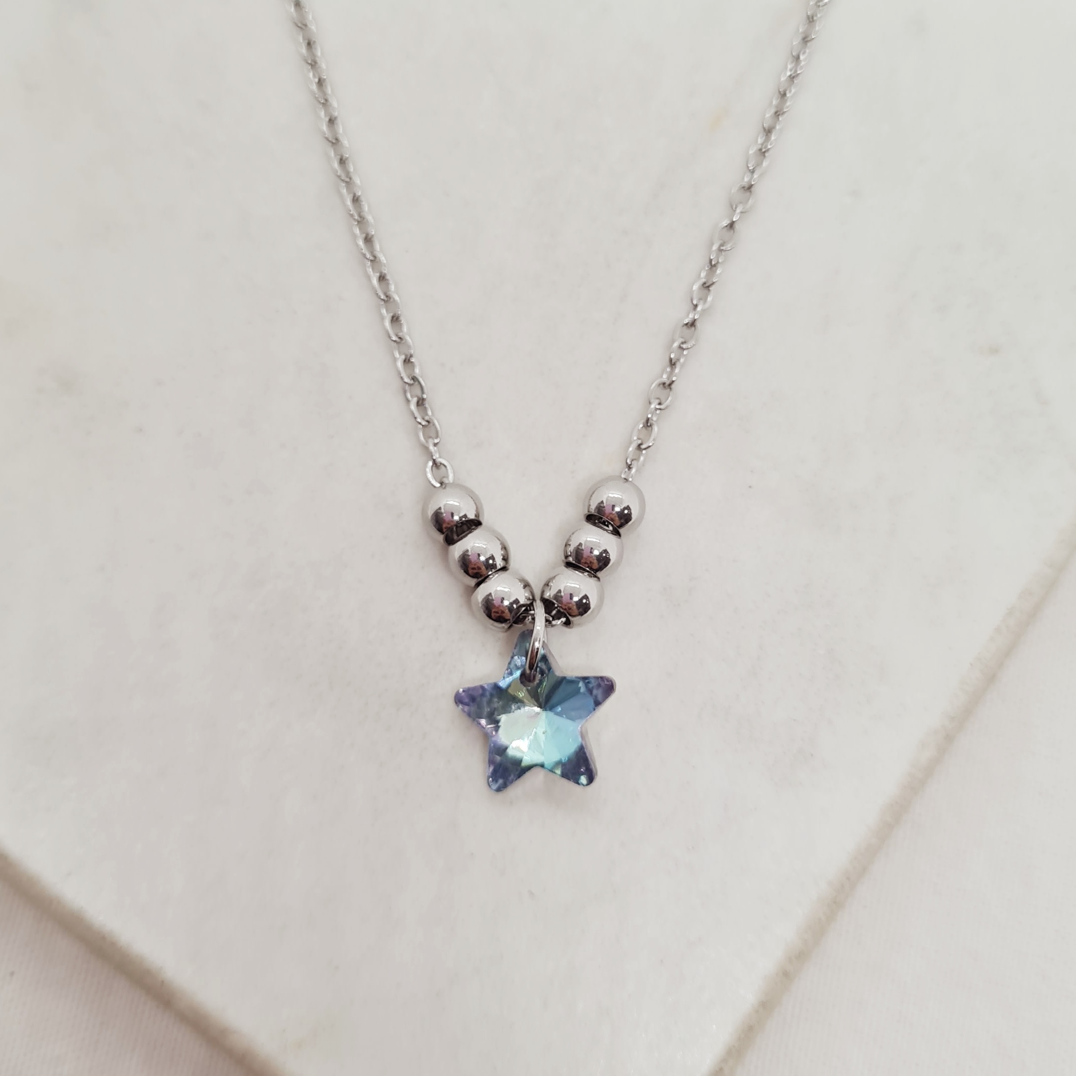 Imagen de producto COLLAR CON BOLITAS - ESTRELLA CELESTE