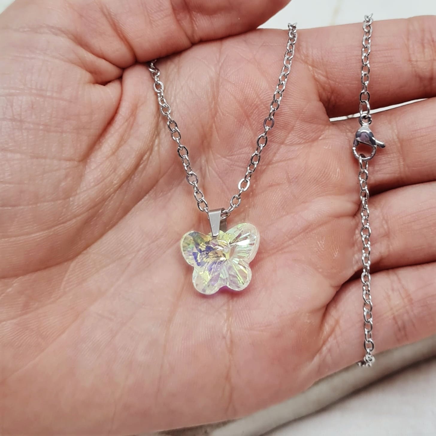 Imagen de producto COLLAR CON DIJE CRISTAL CHICO - MARIPOSA TORNASOL CLARO