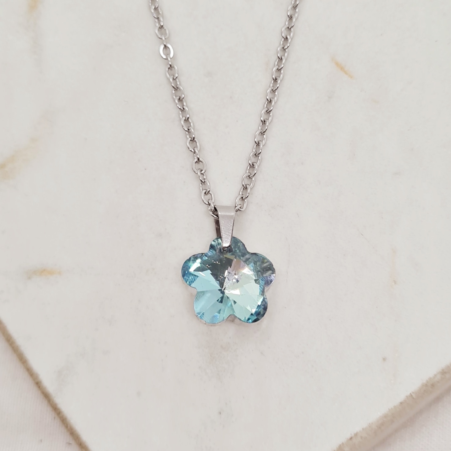 Imagen de producto COLLAR CON DIJE CRISTAL CHICO - FLOR CELESTE