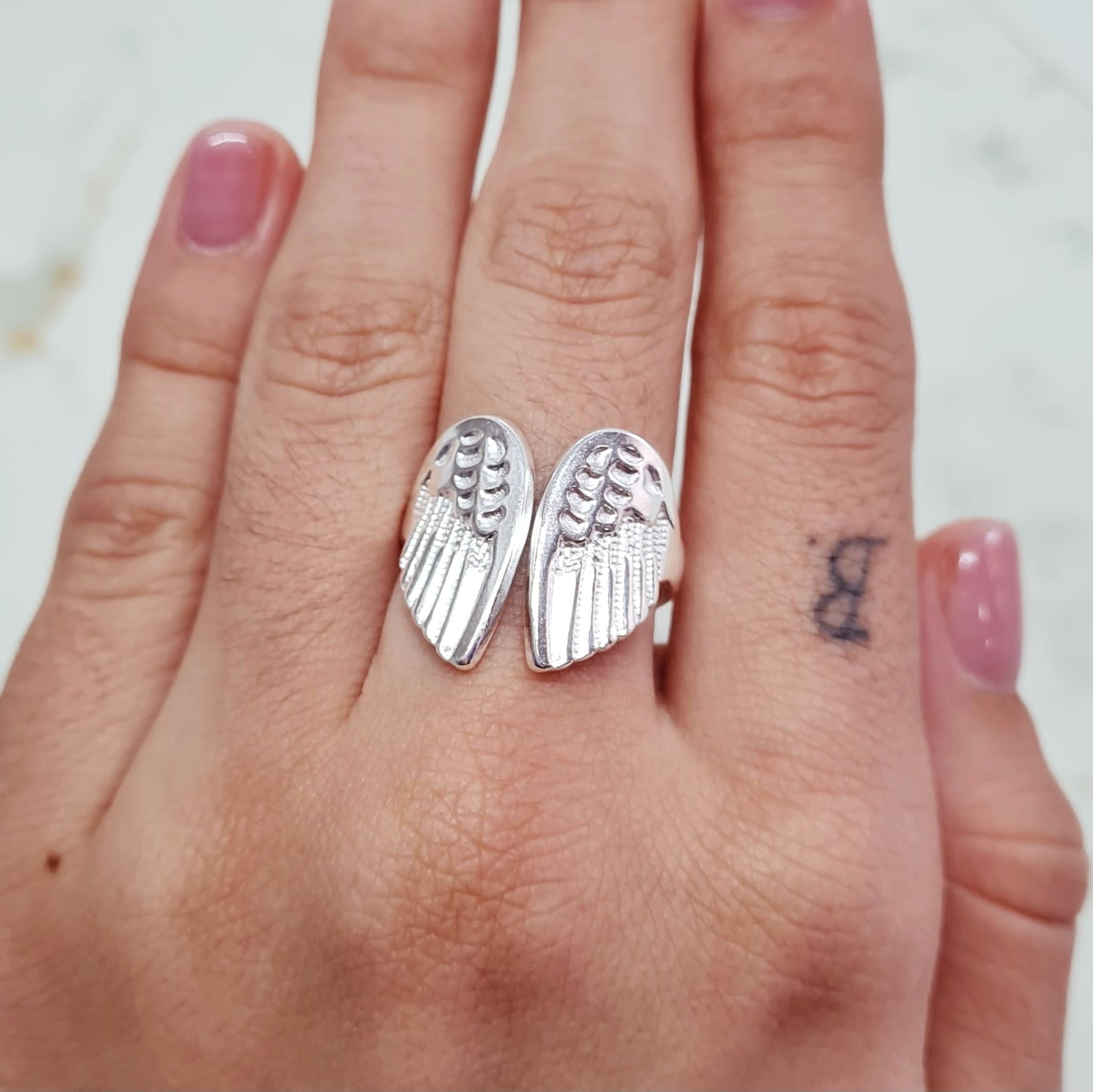 Imagen de producto ANILLO ACERO BLANCO MACIZO - ALAS CHICAS