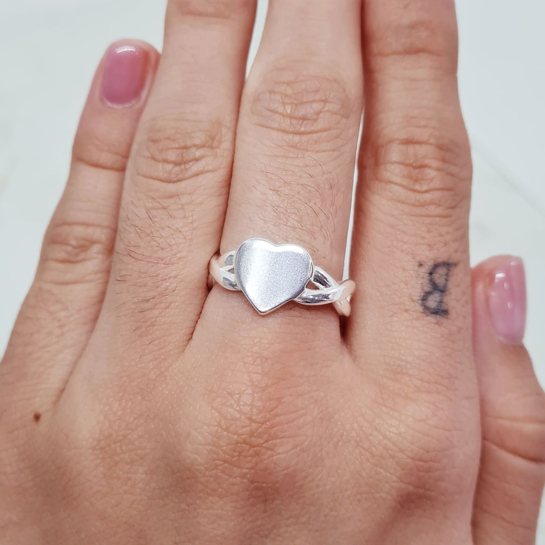 Imagen de producto ANILLO ACERO BLANCO MACIZO - CORAZON LISO Y LINEAS CRUZADAS