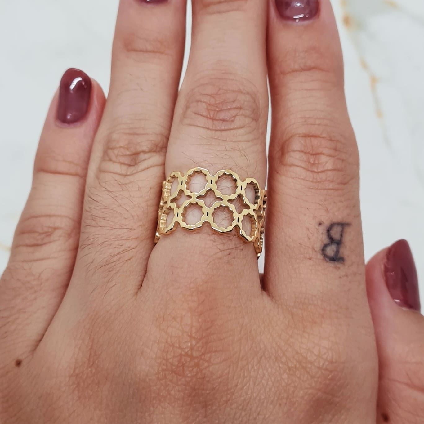 Imagen de producto ANILLO ACERO DORADO - DOBLE HILERA CIRCULOS
