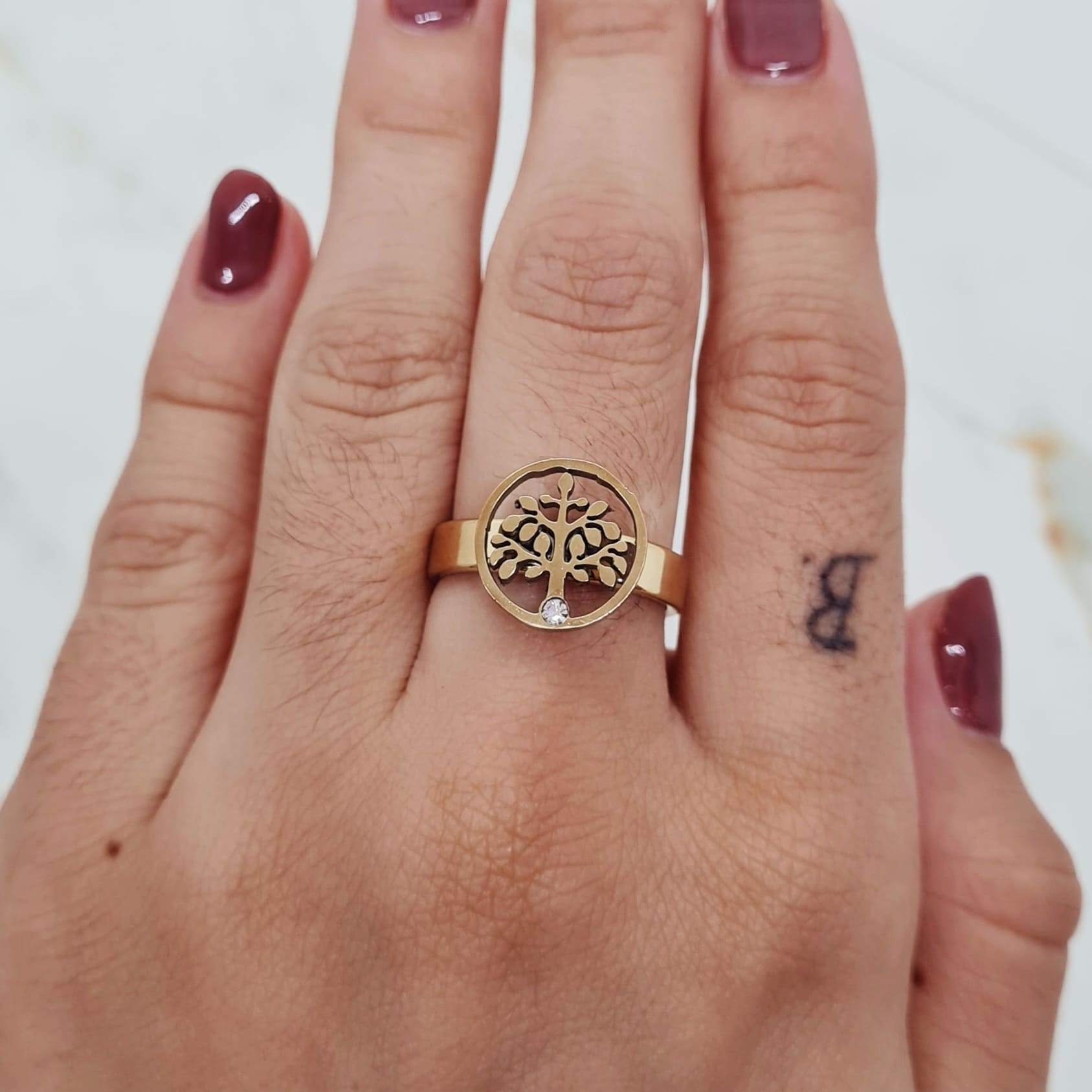 Imagen de producto ANILLO ACERO DORADO CON FORMA Y STRASS BLANCO - ARBOL DE LA VIDA