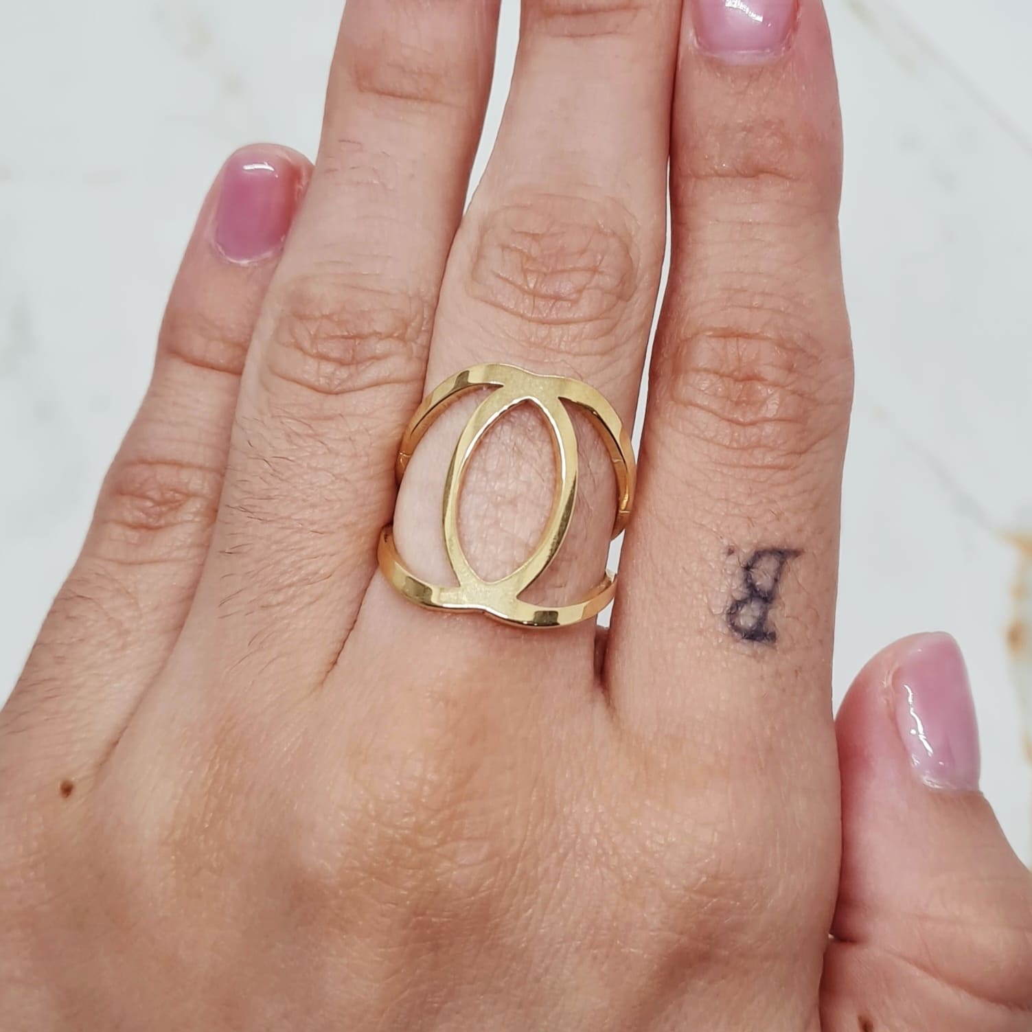 Imagen de producto ANILLO ACERO DORADO - OVALO DOBLE LINEA