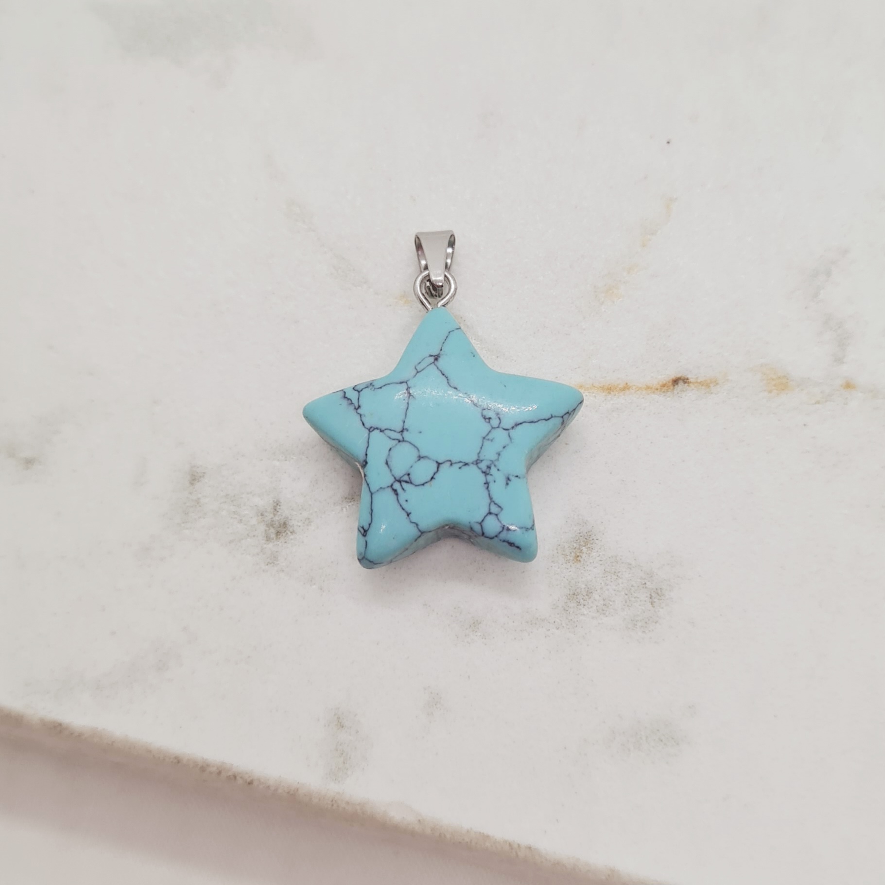 Imagen de producto DIJE DE PIEDRA TURQUESA - ESTRELLA