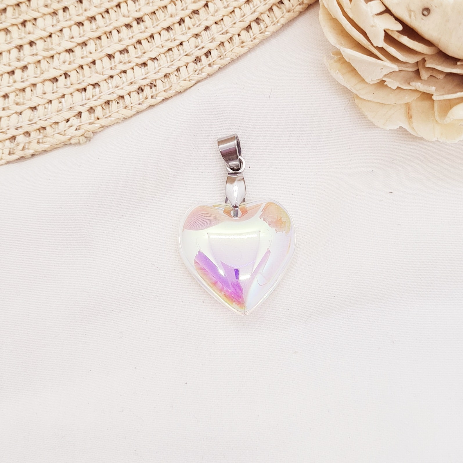 Imagen de producto DIJE CORAZON DE CRISTAL - TORNASOL TRANSLUCIDO CLARO