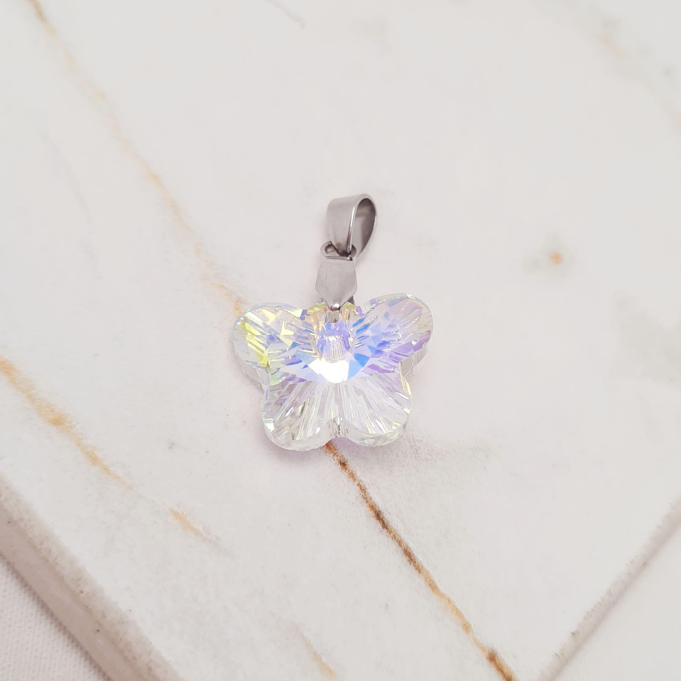 Imagen de producto DIJE DE CRISTAL -  MARIPOSA TORNASOL CLARO
