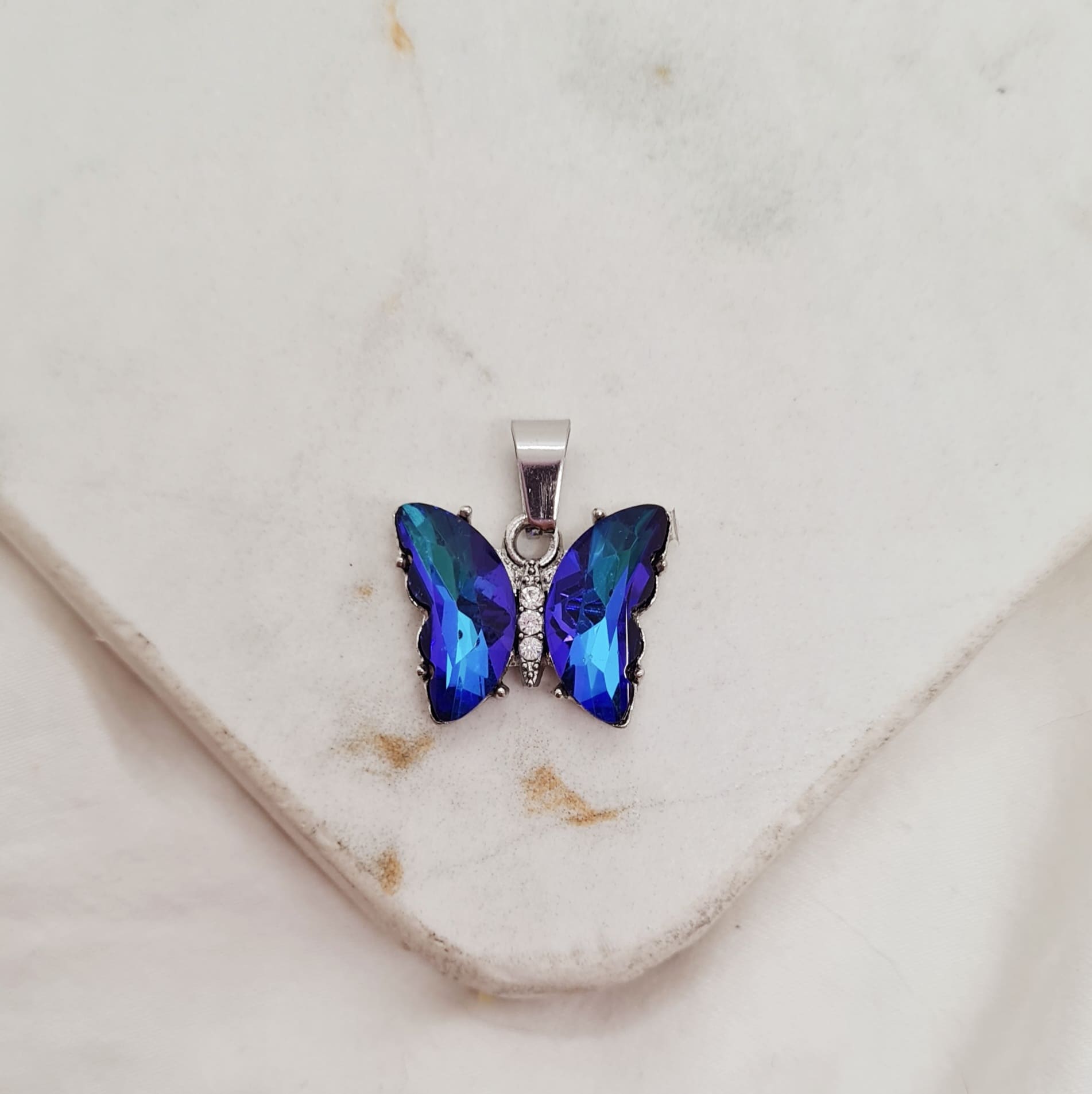 Imagen de producto DIJE MARIPOSA DE CRISTAL ENGARZADA - AZUL