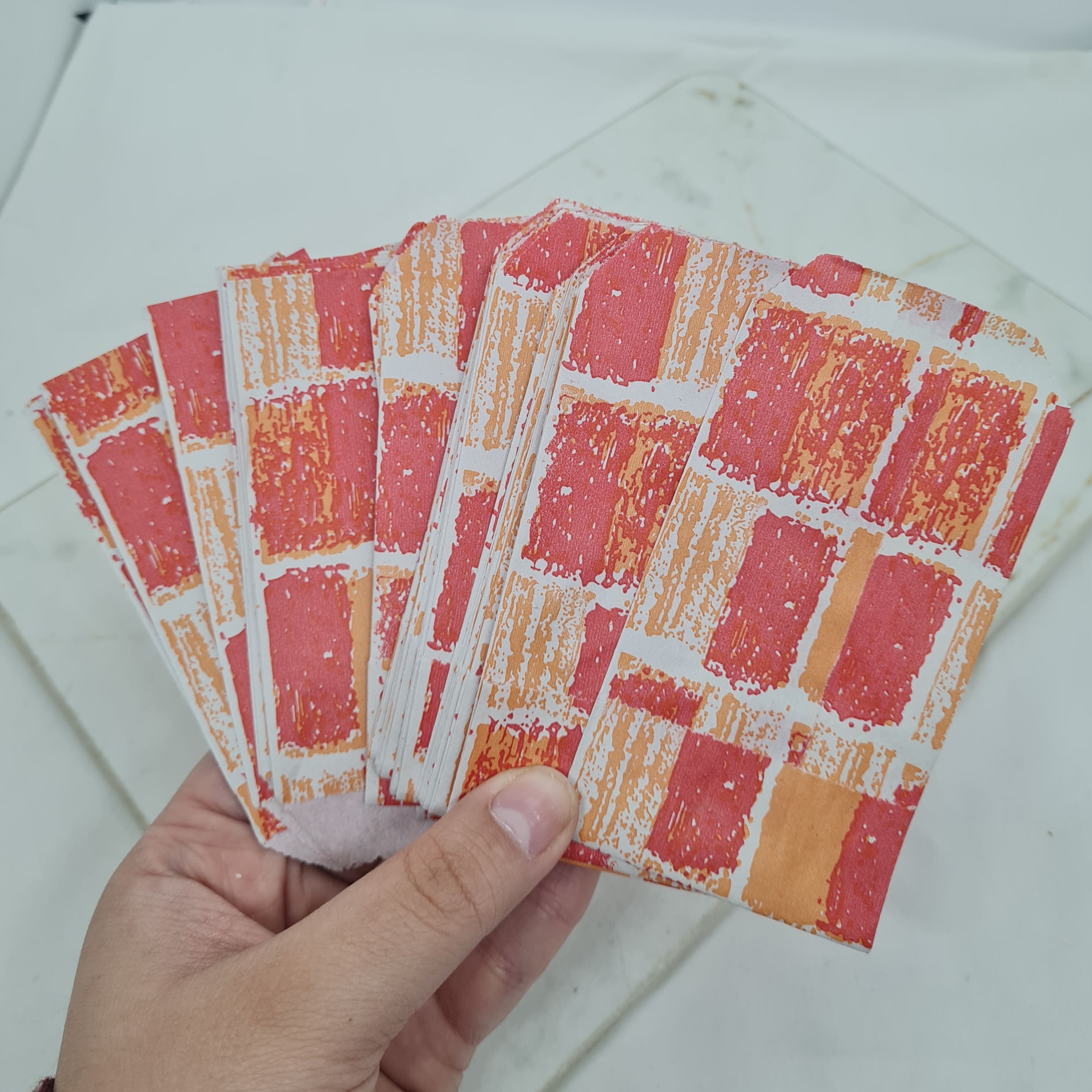 Imagen de producto BOLSAS DE PAPEL X100 UNIDADES - RECTANGULOS NARANJAS